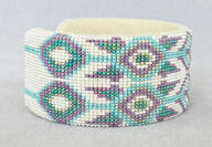 Yonavea unique white/multi cut bead world and star cuff